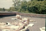 LU-257.191, Sunbathers on roof of Longwood College building 1960