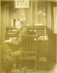 LU-083.1747 - NHNSG, 1901. Man seated at desk