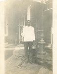 HS-022.032, Unidentified African-American man wearing white coat, holding a tray