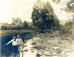 LU-157.0156 - Two unidentified children wading in creek by John Chester Mattoon