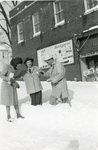 Nancy Wolfe, Anne Easley, and Hubby playing in snow