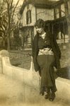 LU-387.038, Unidentified woman seated on wall in front of unidentified High Street home. by Katherine Krebs
