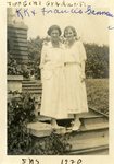 LU-387.008, Two women standing on stairs in front of unidentified campus building. Inscribed on top margin, "Two Girl Graduates, K.K. (Katherine Krebs) and Francis Gannaway." Inscribed on bottom margin, "SNS 1920." by Katherine Krebs