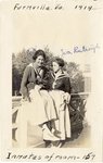 LU-387.003, Two women on elevated breezeway. Inscribed on top margin, "Farmville, Va. 1919" and on bottom margin, "Inmates of room-157. Katherine Krebs and Eva Rutrough" by Katherine Krebs